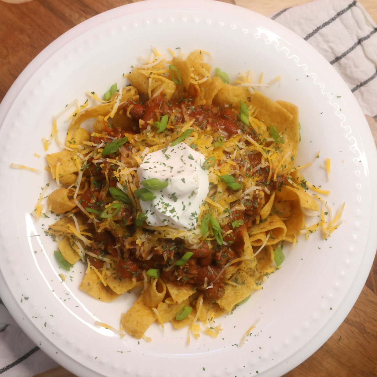 Overhead image of Instant Pot Frito Pie in a white bowl