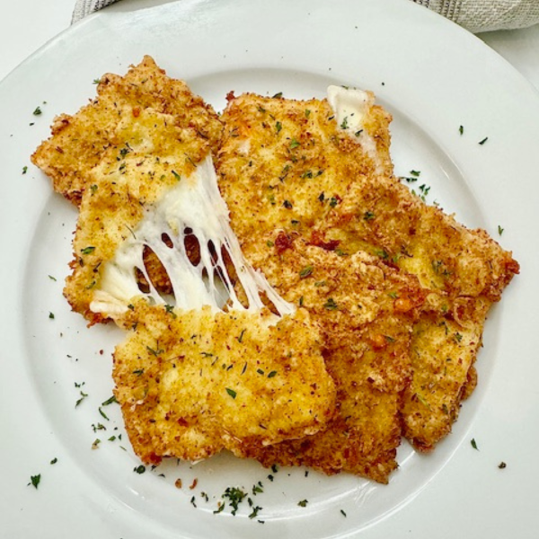 Overhead image of Copycat Chili's Mozzarella Sticks on a white plate