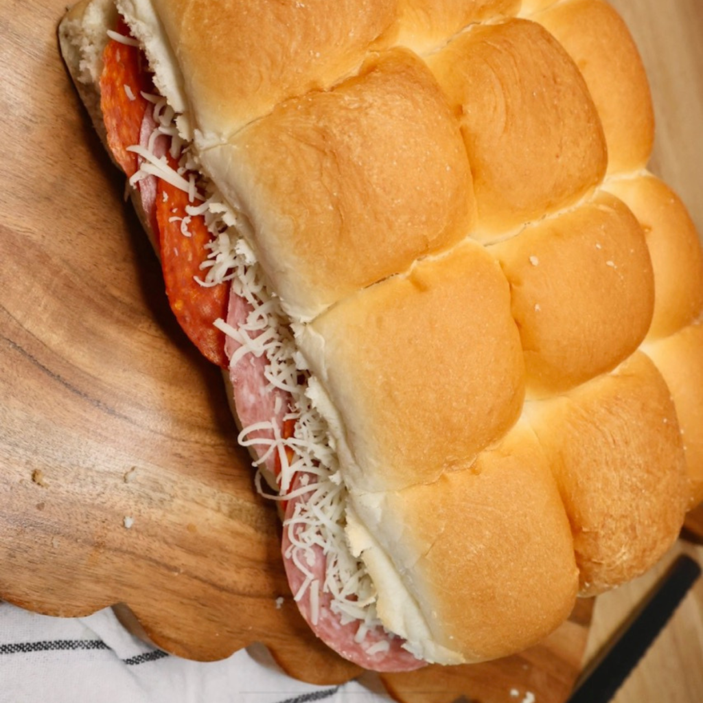 Assembled Hawaiian Roll Italian Sliders on a serving tray