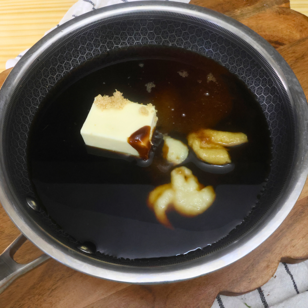 Ingredients needed to make bourbonless chicken thighs sauce in a skillet