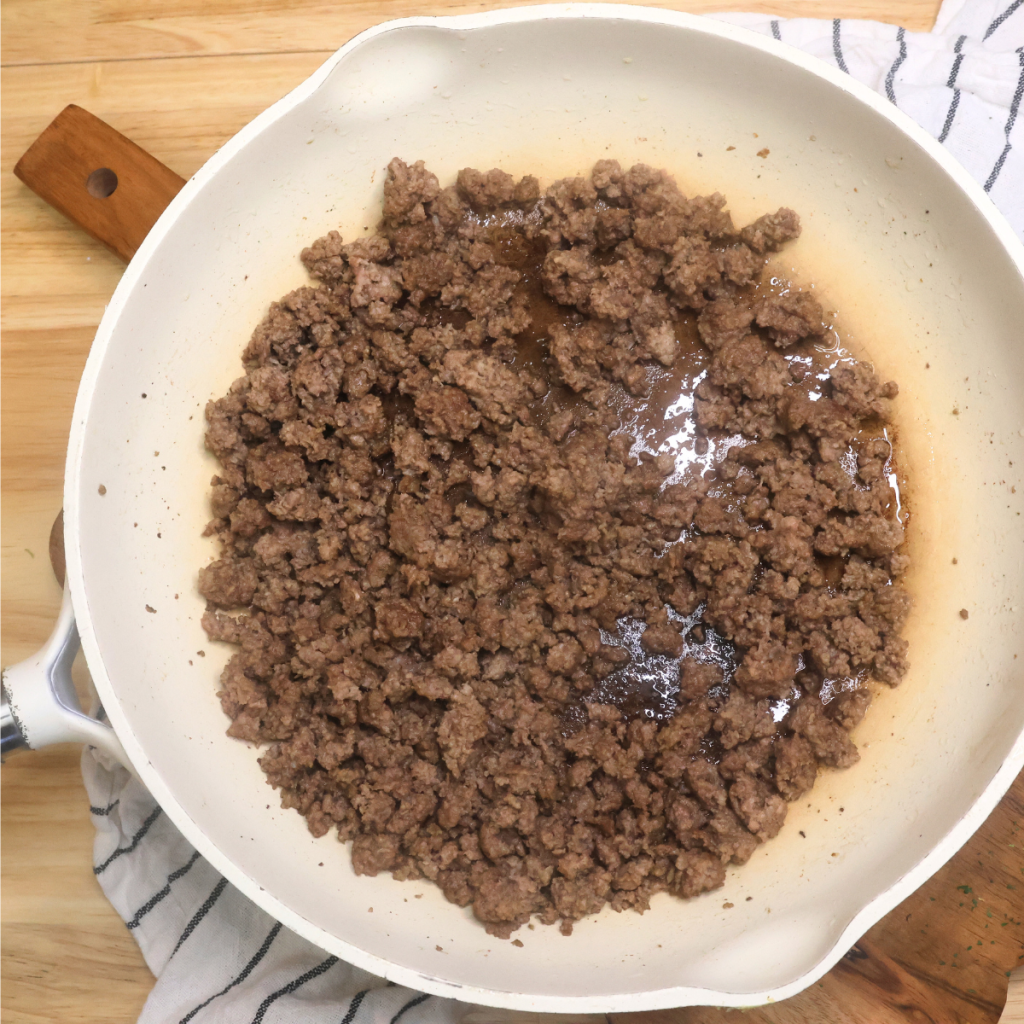 Cooked ground beef in a skillet