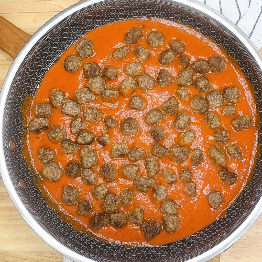 Mini Meatballs in a skillet with marinara sauce