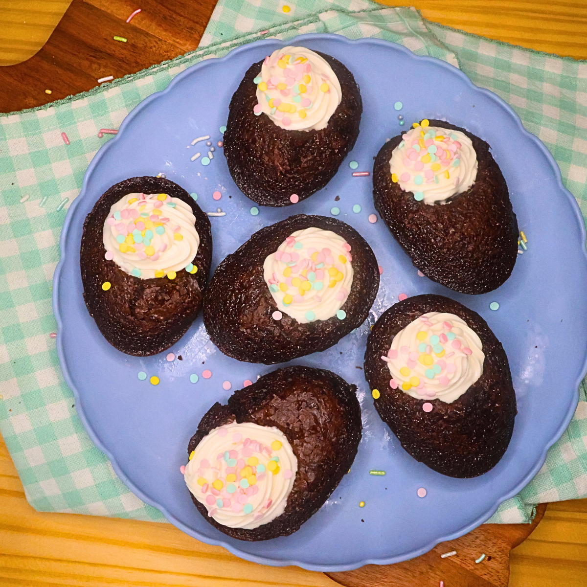 Overhead image of Deviled Brownies with Easter Sprinkles on a blue plate